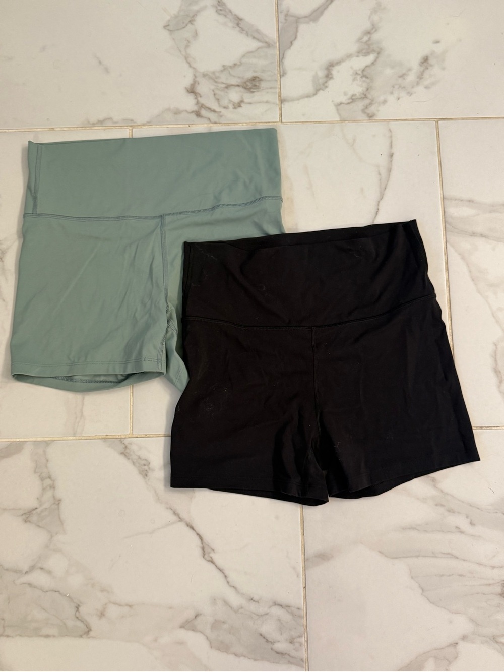 all in motion High-Rise 4”Bike Shorts in Sage Green & Black